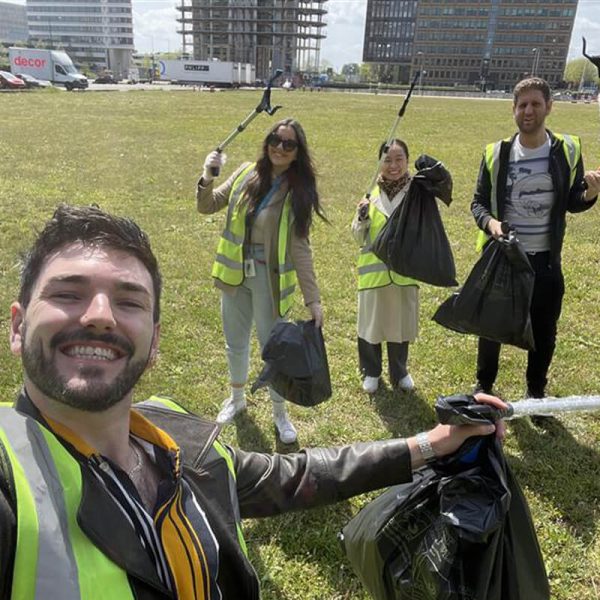Photo of people picking up rubbish