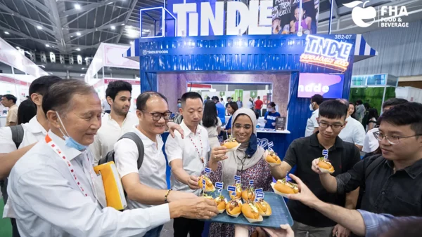 Attendees taste an exhibitor’s latest culinary delicacy at FHA Food & Beverage event, which brings together a diverse array of global suppliers and key buyers from Asia and beyond. 